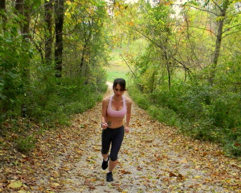 Woman Running on Trail