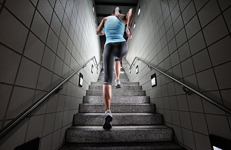 Woman Running Up Stairs
