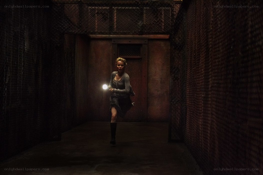 woman running with flashlight