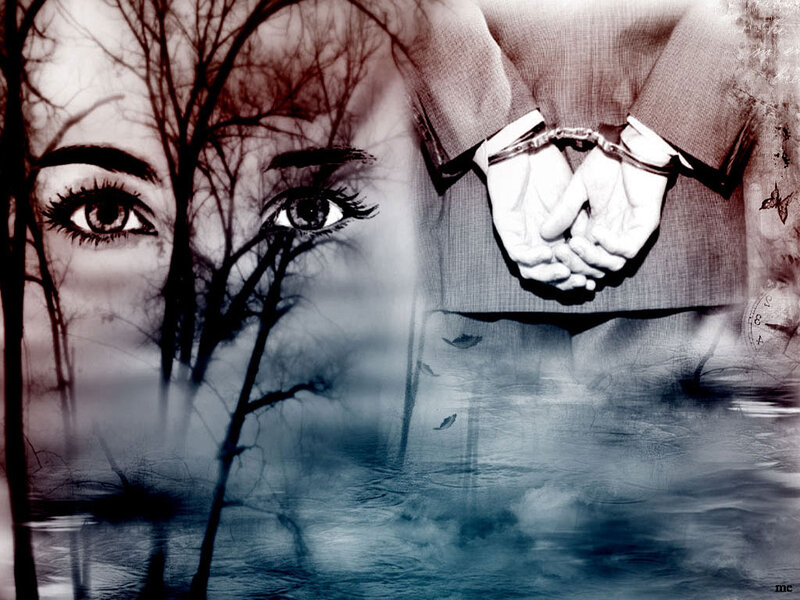 Woman's Eyes and Handcuffed Hands
