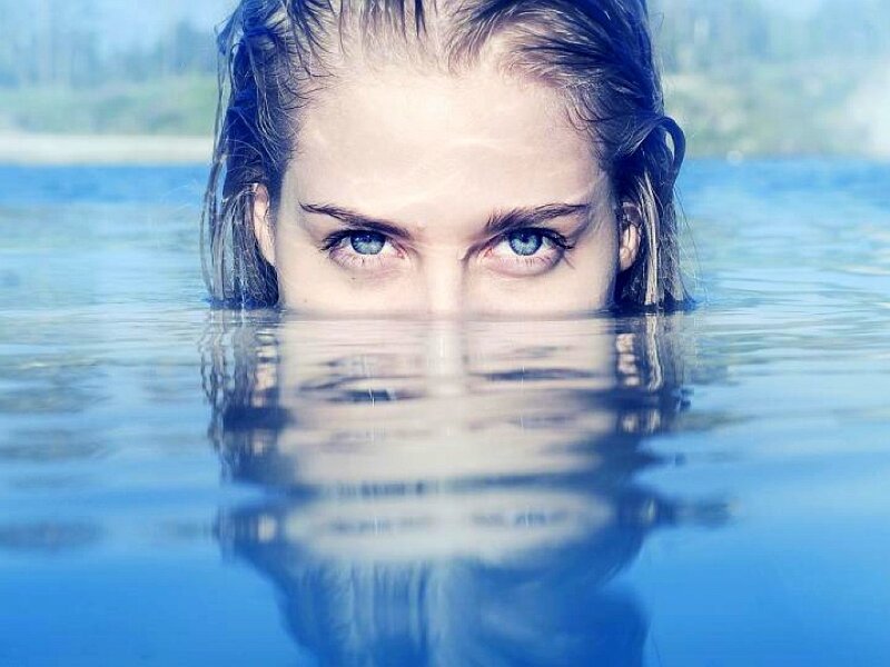 woman's eyes in water