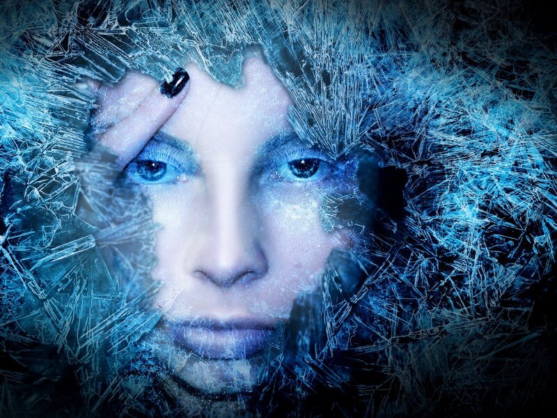 Woman's Face Behind Ice