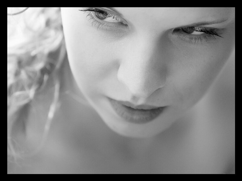 Woman's Face in Close-up — Black, Contemplative