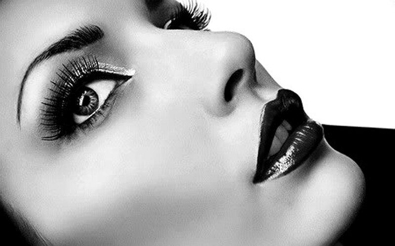 Woman's Face in Close-up — Black, Dramatic, Photograph, Eyes, Lips