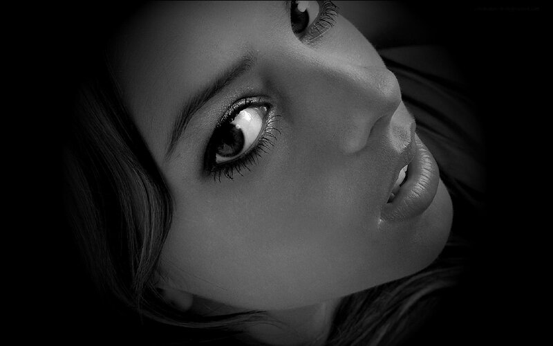 Woman's Face in Close-up — Black, Dramatic, Photograph