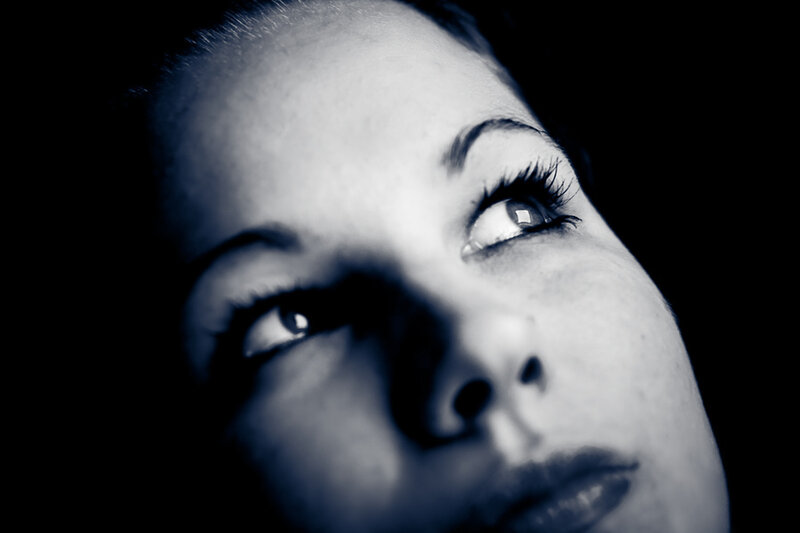 Woman's Face in Close-up — Black, Dramatic