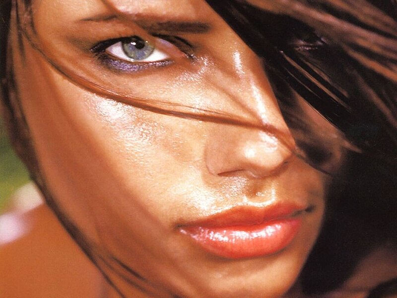 Woman's Face in Close-up — Brown, Dramatic, Photograph, Hair