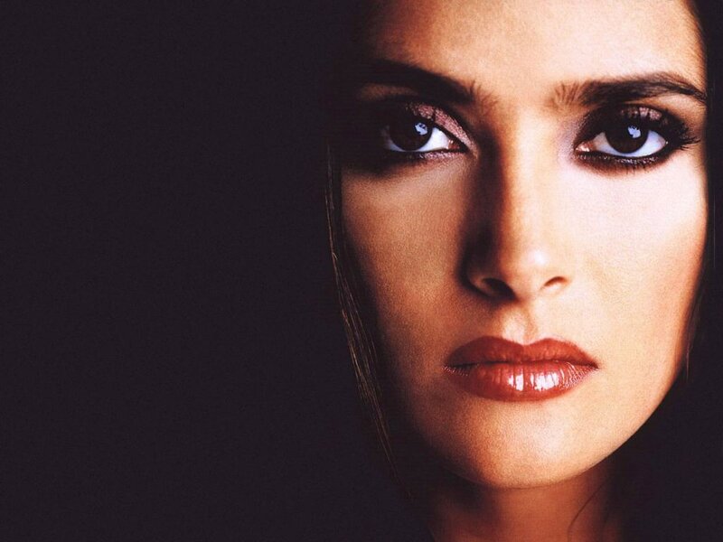 Woman's Face in Close-up — Brown, Dramatic, Photograph