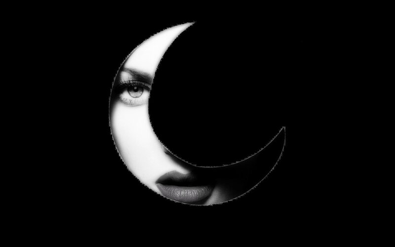 Woman's Face in Crescent Moon