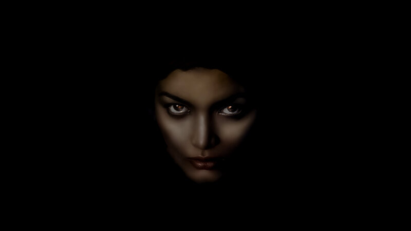 Woman's Face in Darkness — Black, Dramatic