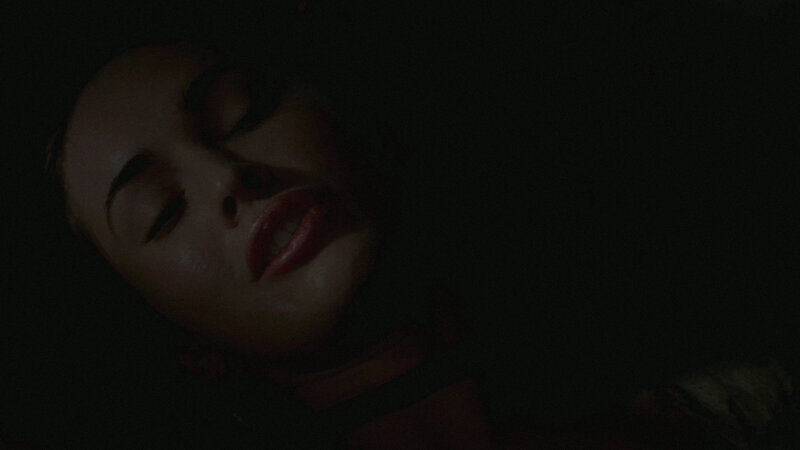 Woman's Face in Darkness