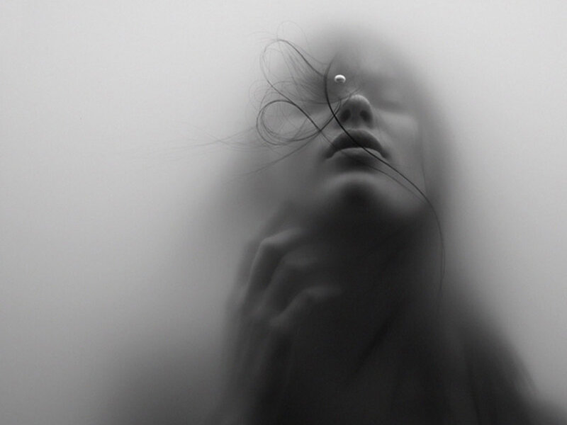 Woman's Face in Fog