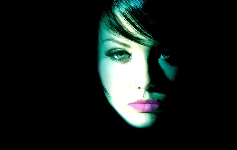 woman's face in green light