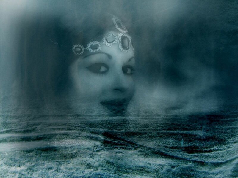 woman's face in misty water