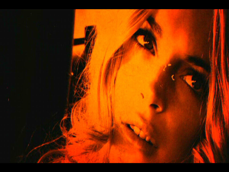 Woman's Face in Orange Light