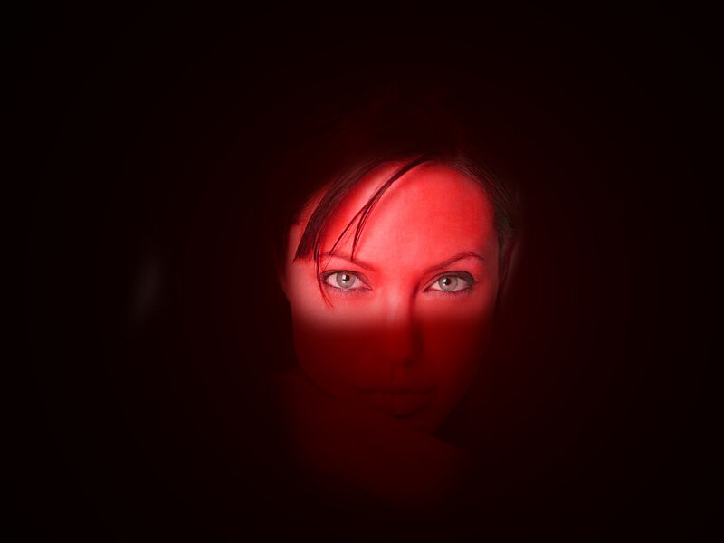 woman's face in red light