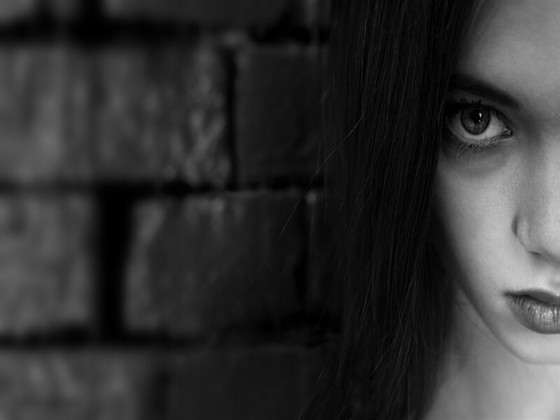 Woman's Face in Shadow — Black, Dramatic, Photograph, Brick Wall