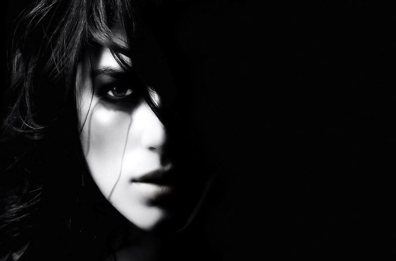 Woman's Face in Shadow — Black, Dramatic, Photograph, Hair