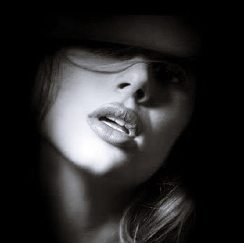 Woman's Face in Shadow — Black