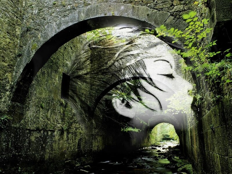 woman's face in stone tunnel