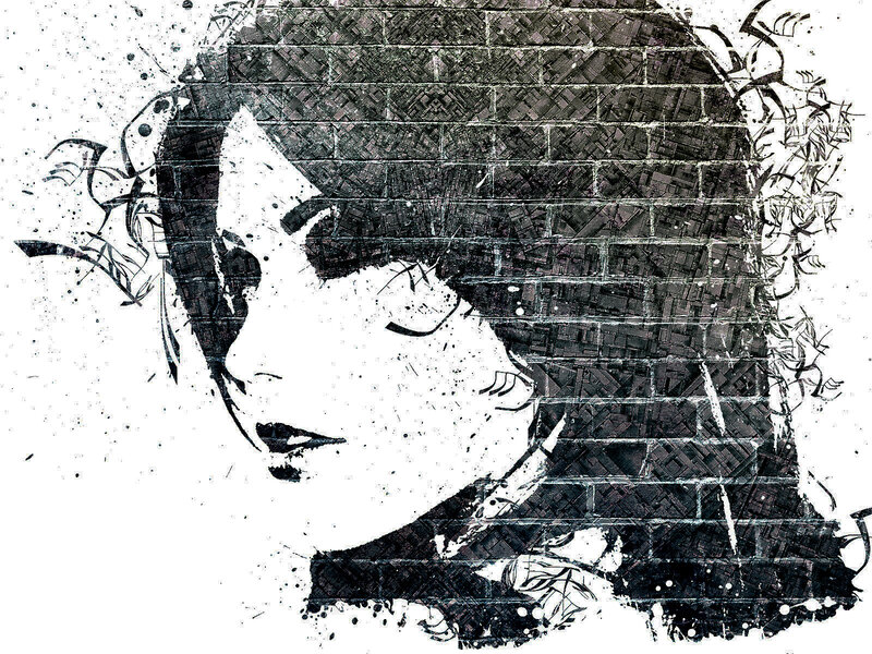 woman's face on brick wall