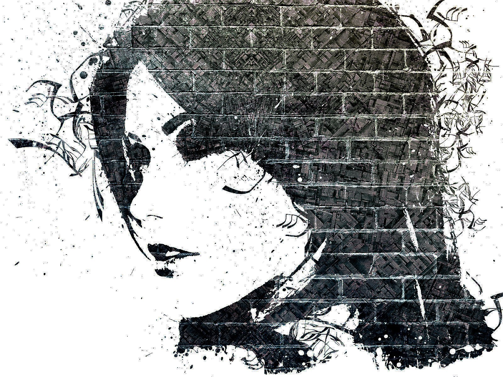 woman's face on brick wall