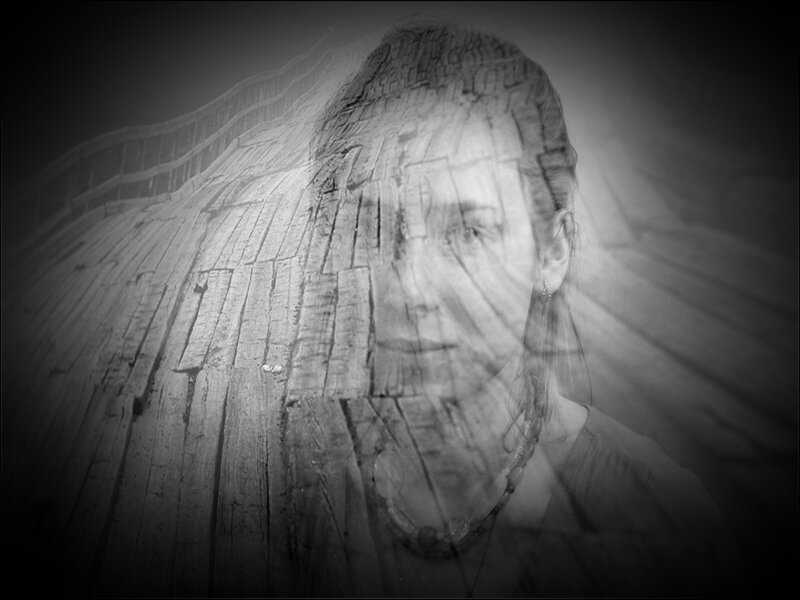 Woman's Face on Wood