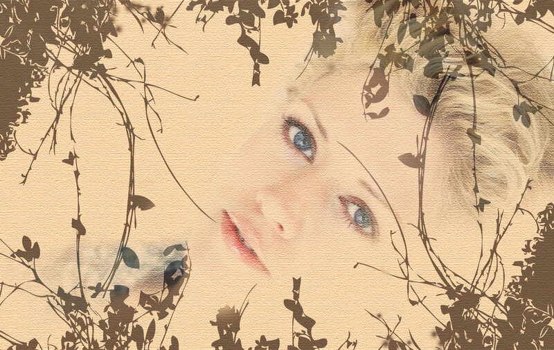 Woman's Face Through Vines