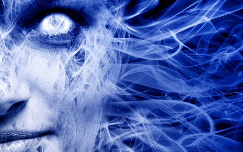 Woman's Face with Blue Energy — Dramatic