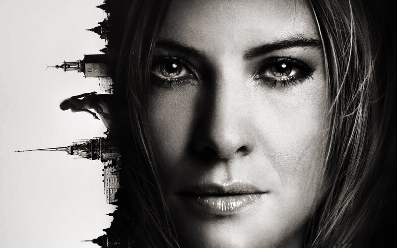 Woman's face with cityscape
