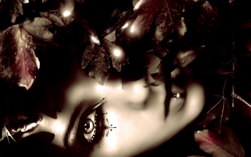Woman's Face with Leaves — Black