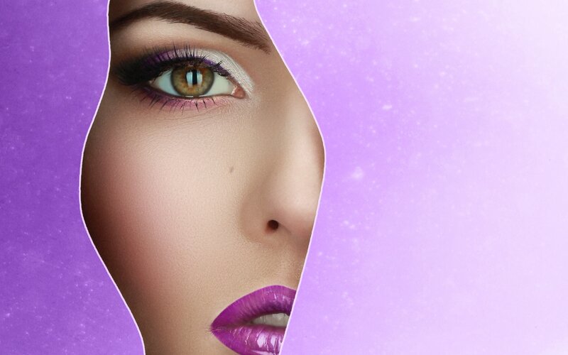 Woman's Face with Purple Makeup