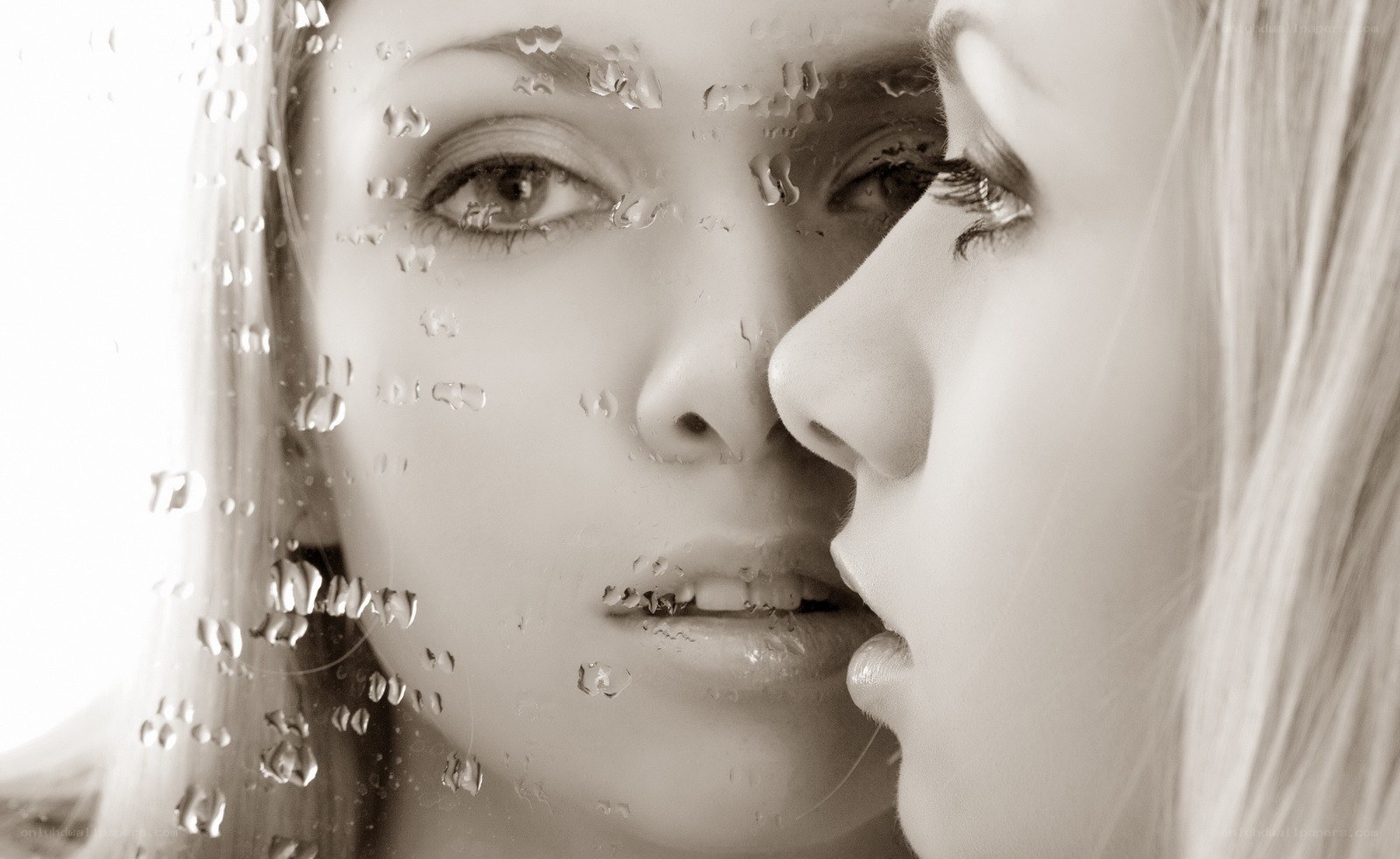 woman's face with raindrops