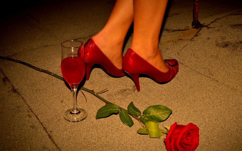 Woman's Feet in Red Heels