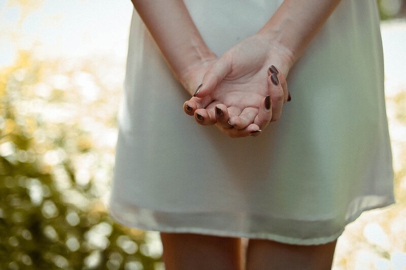 Woman's Hands Clasped