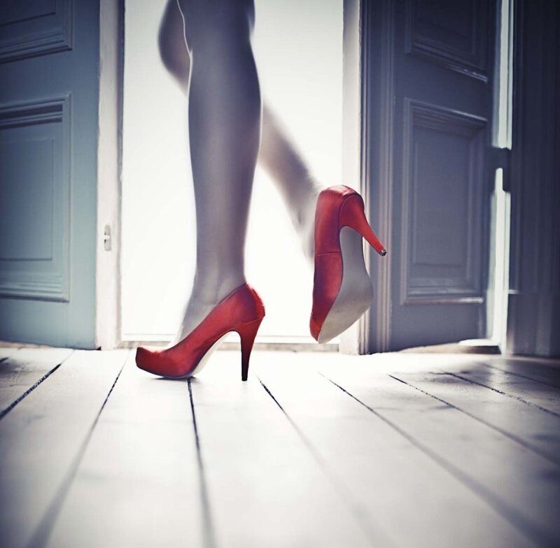 Woman's Legs in Red Heels