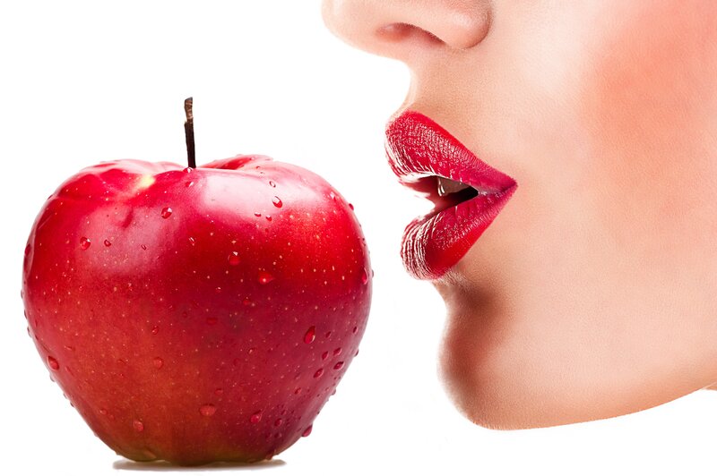 Woman's Lips and Apple