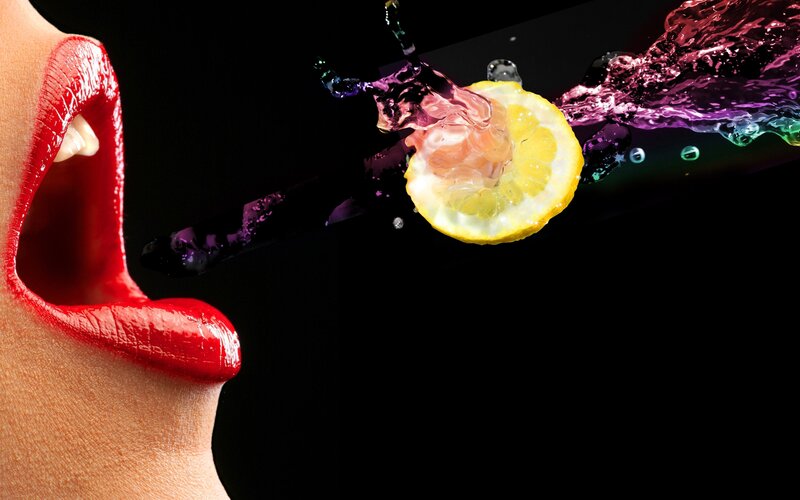 Woman's Mouth with Lemon