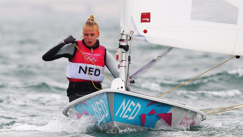 Woman Sailing a Boat