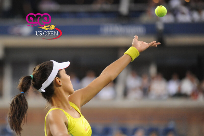 Woman Serving Tennis Ball