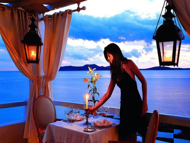 Woman Setting Dinner Table