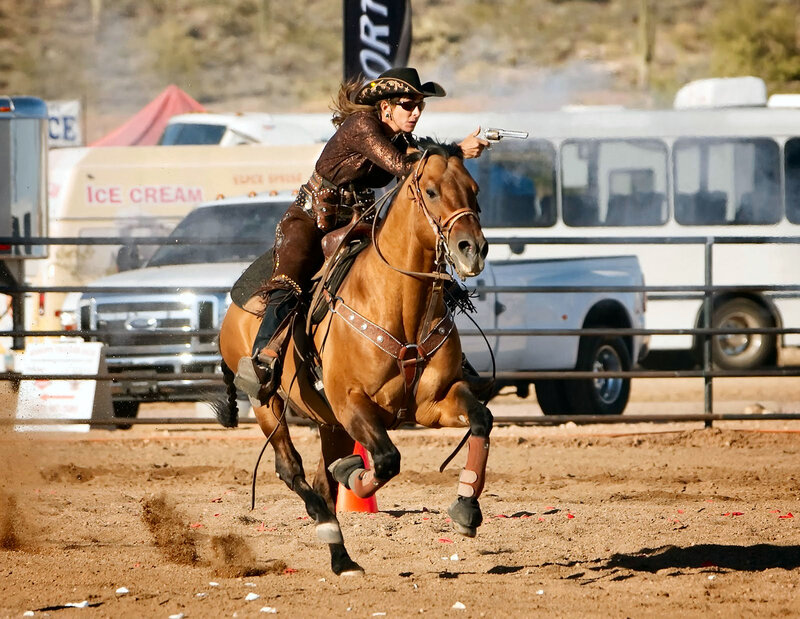 Woman Shooting Horse