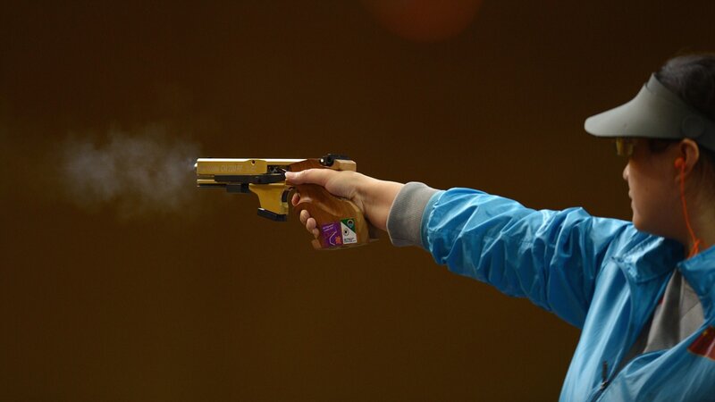 Woman Shooting Pistol
