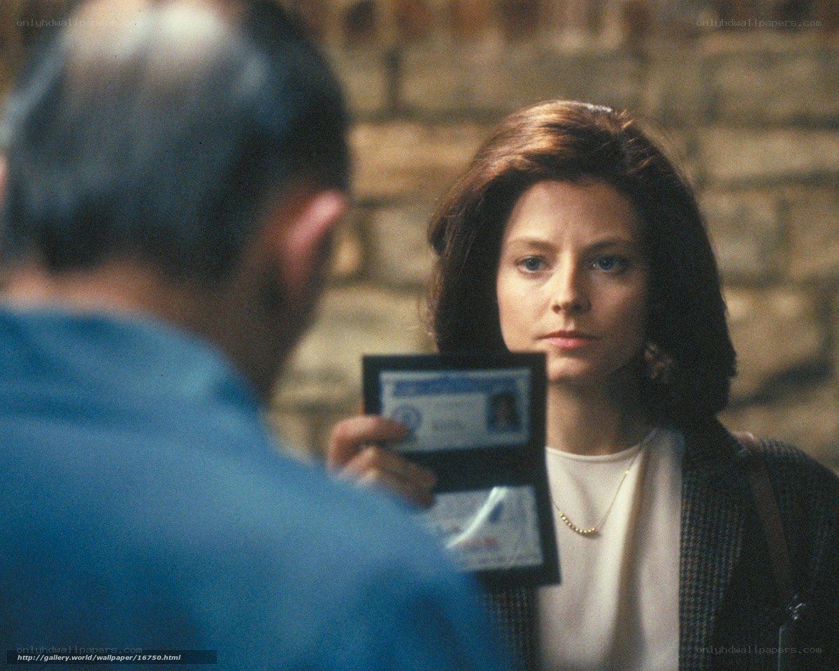 woman showing ID badge