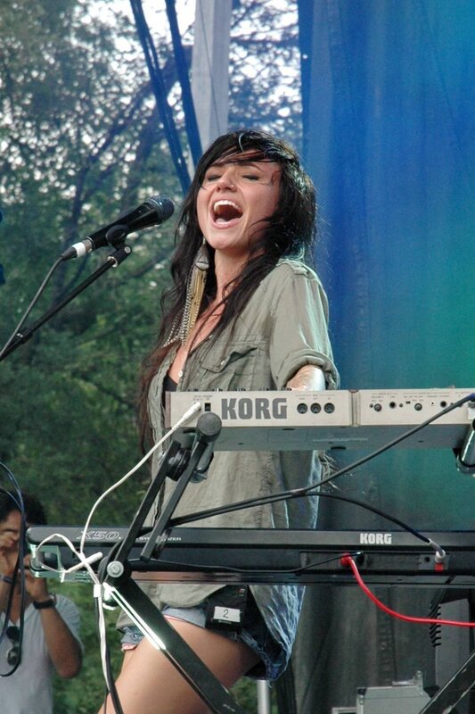woman singing at keyboard