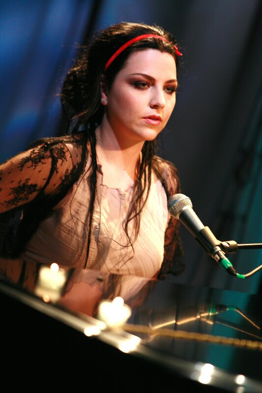 Woman singing at piano