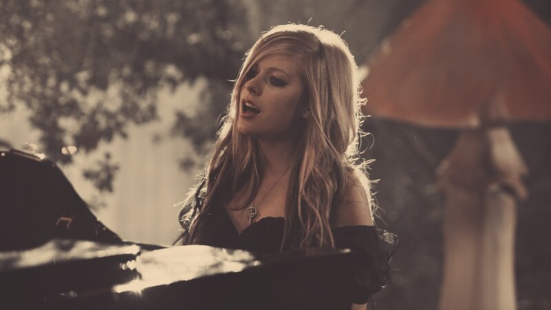 woman singing at piano