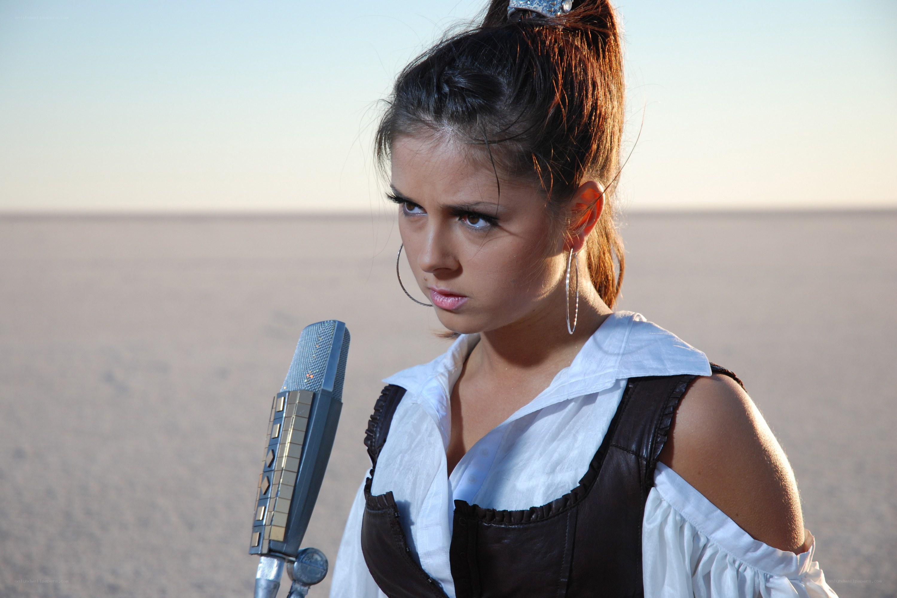 woman singing in desert