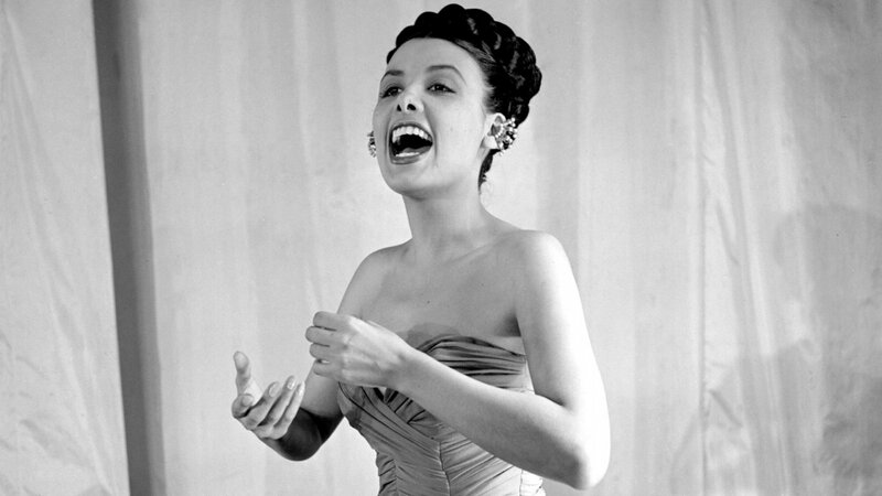 Woman Singing in Dress