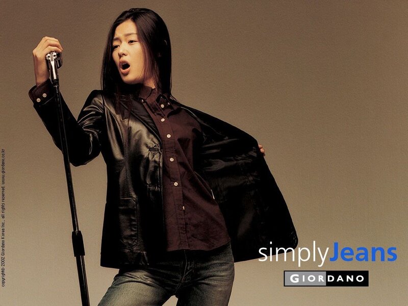 woman singing in leather jacket